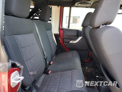 Zdjęcie 10 z 14 samochodu: 2011 JEEP WRANGLER UNLIMITED SAHARA VIN:1J4BA5H19BL549708 - miniatura