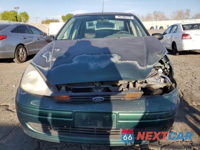 Piąte zdjęcie samochodu w środku: 2000 FORD FOCUS LX VIN:1FAFP33P3YW215712 - miniatura