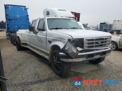 Czwarte zdjęcie samochodu z boku: 1997 FORD F350 VIN:1FTJW35F3VEC06196 - miniatura