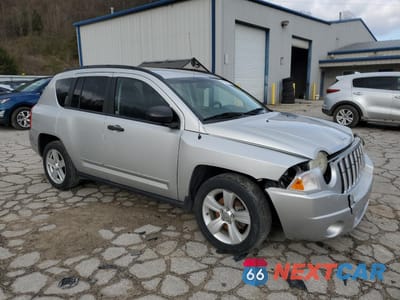 Czwarte zdjęcie samochodu z boku: 2009 JEEP COMPASS SPORT VIN:1J4FT47A79D124239 - miniatura
