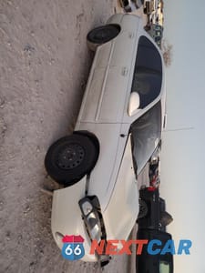 Czwarte zdjęcie samochodu z boku: 2000 NISSAN SENTRA BASE VIN:3N1CB51DXYL345902 - miniatura