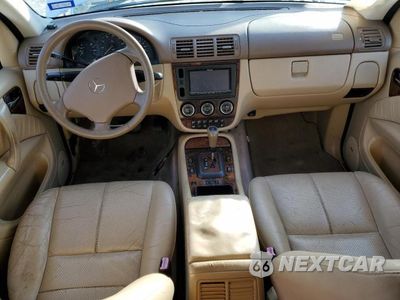 Zdjęcie 8 z 13 samochodu: 2003 MERCEDES BENZ ML 350 VIN:4JGAB57E93A420668 - miniatura