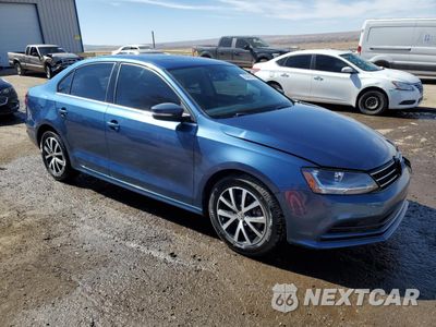 Czwarte zdjęcie samochodu z boku: 2017 VOLKSWAGEN JETTA SE VIN:3VWDB7AJ0HM206985 - miniatura