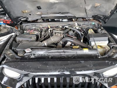 Zdjęcie 12 z 14 samochodu: 2008 JEEP WRANGLER UNLIMITED SAHARA VIN:1J8GB59118L589452 - miniatura
