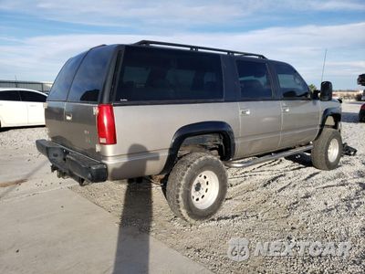 Trzecie zdjęcie samochodu z tyłu: 1999 GMC SUBURBAN K1500 VIN:1GDFK16R6XJ778691 - miniatura