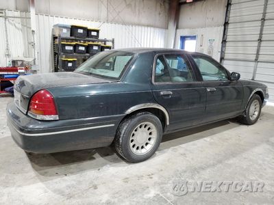 Trzecie zdjęcie samochodu z tyłu: 1998 FORD CROWN VICTORIA LX VIN:2FAFP74W0WX187849 - miniatura
