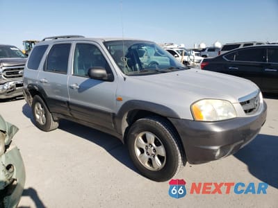 Czwarte zdjęcie samochodu z boku: 2003 MAZDA TRIBUTE LX VIN:4F2YZ941X3KM52191 - miniatura