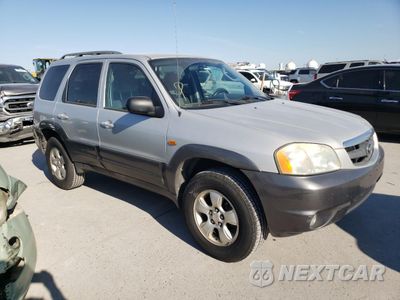 Czwarte zdjęcie samochodu z boku: 2003 MAZDA TRIBUTE LX VIN:4F2YZ941X3KM52191 - miniatura