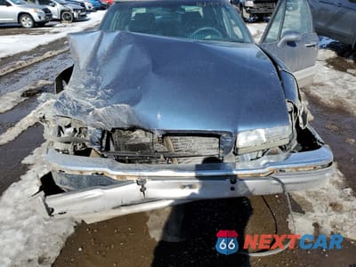 Zdjęcie 12 z 14 samochodu: 1996 BUICK PARK AVENUE ULTRA VIN:1G4CU5219TH603048 - miniatura