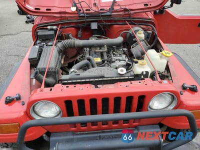 Zdjęcie 12 z 14 samochodu: 1997 JEEP WRANGLER / TJ SPORT VIN:1J4FY19S1VP446857 - miniatura