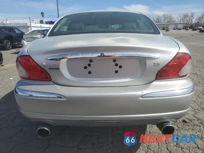 Zdjęcie 6 z 12 samochodu: 2003 JAGUAR X-TYPE 2.5 VIN:SAJEA51DX3XD48180 - miniatura