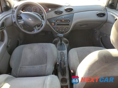 Zdjęcie 8 z 12 samochodu: 2000 FORD FOCUS LX VIN:1FAFP33P3YW215712 - miniatura