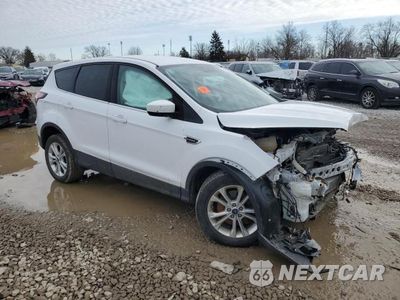 Czwarte zdjęcie samochodu z boku: 2017 FORD ESCAPE SE VIN:1FMCU0G94HUA92851 - miniatura