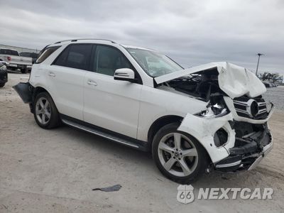 Czwarte zdjęcie samochodu z boku: 2019 MERCEDES-BENZ GLE 400 4MATIC VIN:4JGDA5GBXKB216198 - miniatura