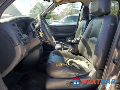 Zdjęcie 7 z 16 samochodu: 2003 MAZDA TRIBUTE ES VIN:4F2CZ06143KM32909 - miniatura