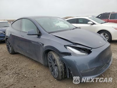 Czwarte zdjęcie samochodu z boku: 2022 TESLA MODEL Y VIN:7SAYGDEF9NF494597 - miniatura