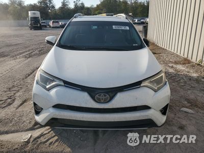 Piąte zdjęcie samochodu w środku: 2017 TOYOTA RAV4 XLE VIN:JTMWFREV8HD092884 - miniatura