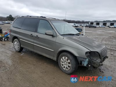 Czwarte zdjęcie samochodu z boku: 2005 KIA SEDONA EX VIN:KNDUP132256734210 - miniatura