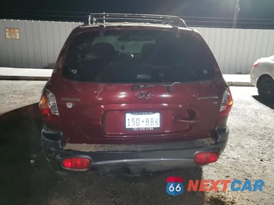 Zdjęcie 6 z 12 samochodu: 2003 HYUNDAI SANTA FE GLS VIN:KM8SC13D83U353745 - miniatura