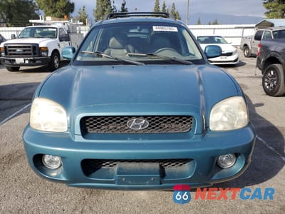 Piąte zdjęcie samochodu w środku: 2002 HYUNDAI SANTA FE GLS VIN:KM8SC13D92U170093 - miniatura