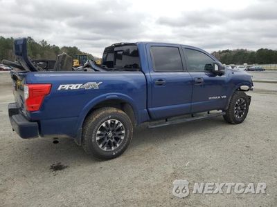 Trzecie zdjęcie samochodu z tyłu: 2018 NISSAN TITAN SV VIN:1N6AA1E55JN531434 - miniatura