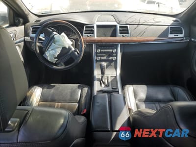 Zdjęcie 8 z 15 samochodu: 2011 LINCOLN MKS VIN:1LNHL9FT0BG610437 - miniatura