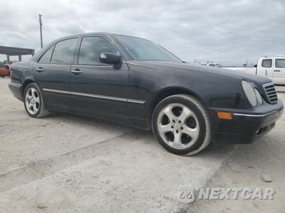 Czwarte zdjęcie samochodu z boku: 2002 MERCEDES-BENZ E 320 VIN:WDBJF65J22B473489 - miniatura
