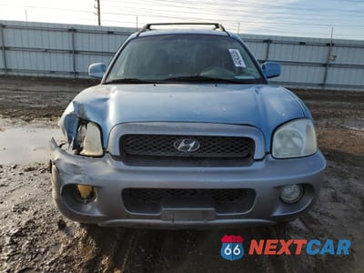 Piąte zdjęcie samochodu w środku: 2003 HYUNDAI SANTA FE GLS VIN:KM8SC13D63U563292 - miniatura