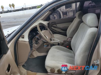 Zdjęcie 11 z 16 samochodu: 1994 TOYOTA CAMRY LE VIN:4T1GK12EXRU018689 - miniatura