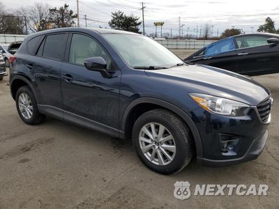 Czwarte zdjęcie samochodu z boku: 2016 MAZDA CX-5 TOURING VIN:JM3KE4CY0G0609576 - miniatura