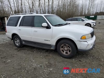 Czwarte zdjęcie samochodu z boku: 2001 LINCOLN NAVIGATOR VIN:5LMFU28R41LJ18753 - miniatura