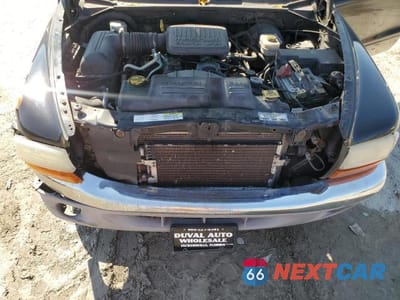 Zdjęcie 11 z 12 samochodu: 2004 DODGE DAKOTA QUAD SLT VIN:1D7HL48KX4S504532 - miniatura