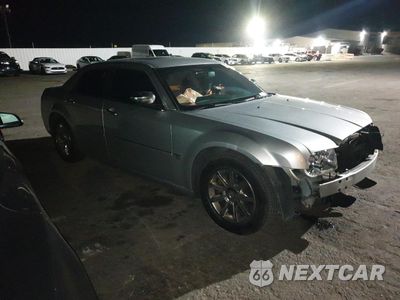 Czwarte zdjęcie samochodu z boku: 2006 CHRYSLER 300C VIN:2C3KA63H36H480201 - miniatura