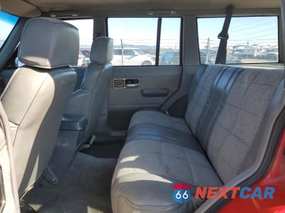 Zdjęcie 11 z 14 samochodu: 1992 JEEP CHEROKEE LAREDO VIN:1J4FJ58S3NL197689 - miniatura