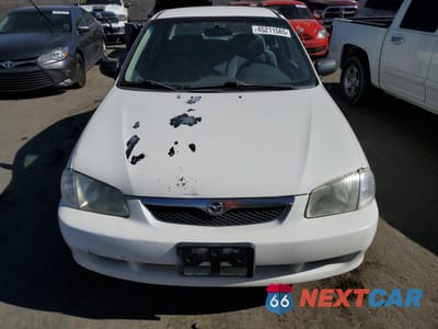 Piąte zdjęcie samochodu w środku: 1999 MAZDA PROTEGE ES VIN:JM1BJ2213X0121378 - miniatura