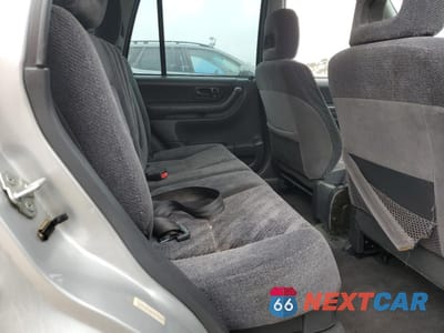 Zdjęcie 11 z 13 samochodu: 1999 HONDA CR-V LX VIN:JHLRD1742XC066524 - miniatura