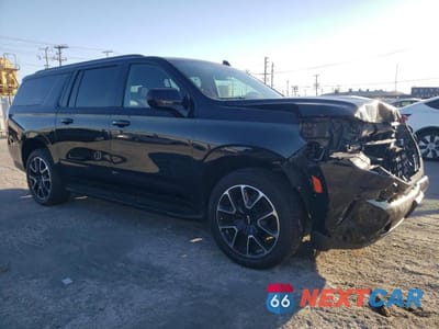Czwarte zdjęcie samochodu z boku: 2023 CHEVROLET SUBURBAN C1500 RST VIN:1GNSCEKD3PR132583 - miniatura