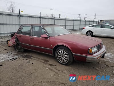 Czwarte zdjęcie samochodu z boku: 1988 OLDSMOBILE DELTA 88 ROYALE BROUGHAM VIN:1G3HY54C0JW377388 - miniatura