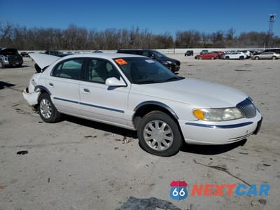 Czwarte zdjęcie samochodu z boku: 2000 LINCOLN CONTINENTAL VIN:1LNHM97V2YY802541 - miniatura