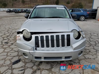 Piąte zdjęcie samochodu w środku: 2009 JEEP COMPASS SPORT VIN:1J4FT47A79D124239 - miniatura