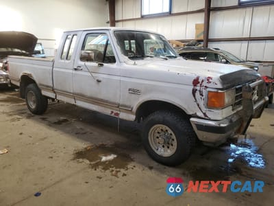 Czwarte zdjęcie samochodu z boku: 1991 FORD F150 VIN:1FTEX14N7MKA09821 - miniatura