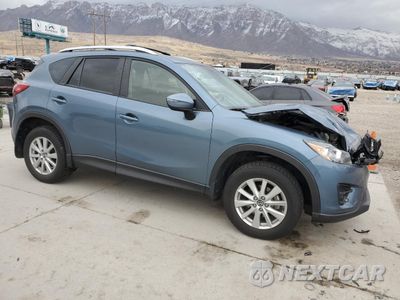 Czwarte zdjęcie samochodu z boku: 2016 MAZDA CX-5 TOURING VIN:JM3KE4CY1G0790283 - miniatura