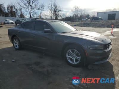Czwarte zdjęcie samochodu z boku: 2020 DODGE CHARGER SXT SXT VIN:2C3CDXBG0LH207318 - miniatura