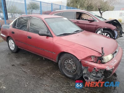 Czwarte zdjęcie samochodu z boku: 1995 TOYOTA COROLLA LE VIN:1NXAE09B6SZ280217 - miniatura