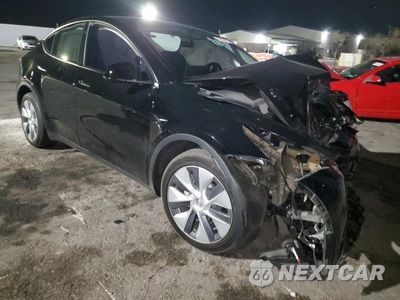 Czwarte zdjęcie samochodu z boku: 2023 TESLA MODEL Y VIN:7SAYGDEE4PA136945 - miniatura