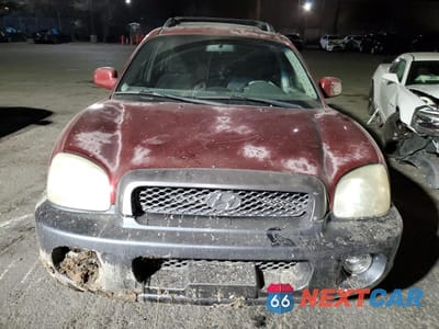 Piąte zdjęcie samochodu w środku: 2003 HYUNDAI SANTA FE GLS VIN:KM8SC13D83U353745 - miniatura