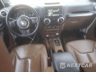 Zdjęcie 8 z 12 samochodu: 2013 JEEP WRANGLER UNLIMITED SAHARA VIN:1C4BJWEG9DL585700 - miniatura