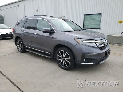 Czwarte zdjęcie samochodu z boku: 2019 HONDA PILOT TOURING VIN:5FNYF5H61KB007759 - miniatura