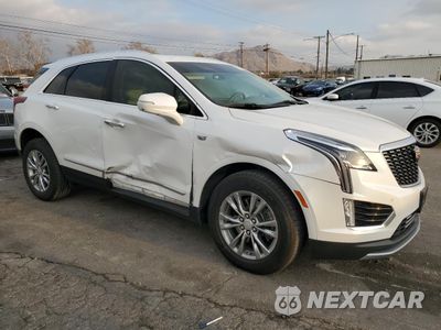 Czwarte zdjęcie samochodu z boku: 2021 CADILLAC XT5 PREMIUM LUXURY VIN:1GYKNCRS8MZ144052 - miniatura