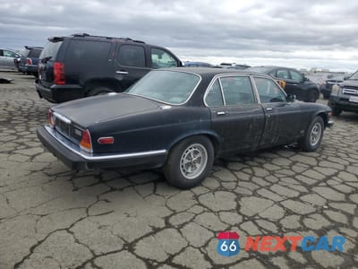 Trzecie zdjęcie samochodu z tyłu: 1985 JAGUAR XJ6 VANDEN PLAS VIN:SAJAY1347FC399810 - miniatura